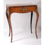 A mid-19th century French kingwood and crossbanded needlework table , of serpentine outline, the