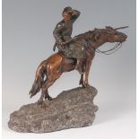 S. Bauer - a large 1920s cold painted bronze model of a Cossack on horseback, holding a shashka