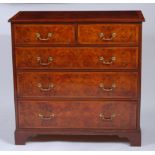 A figured walnut cross and feather banded chest in the mid C18th style, of two short over three long