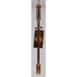 A contemporary brass gimballed ships stick barometer, having a signed silvered scale, with