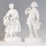A pair of 19th century Meissen porcelain blanc-de-chine figures of flower-pickers, h.23.5cm (with