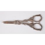 A pair of late Victorian silver grape scissors, the handles cast with acanthus leaves and fruiting