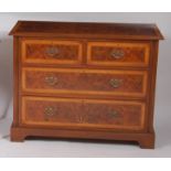 A William & Mary style figured walnut, oak crossbanded and satinwood strung squarefront chest, of