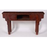 A Chinese softwood alter table, raised on square end supports, w.163cm, d.34cm, h.90cm