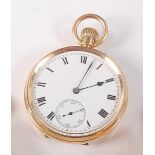 An 18ct yellow gold keyless wind open face pocket watch, having white enamel Roman dial and
