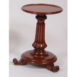 A Victorian and later adapted circular pedestal lamp table, the dished top raised on turned and