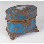 A late 19th century French blue glass and gilt brass mounted perfume casket, of oval form, the top