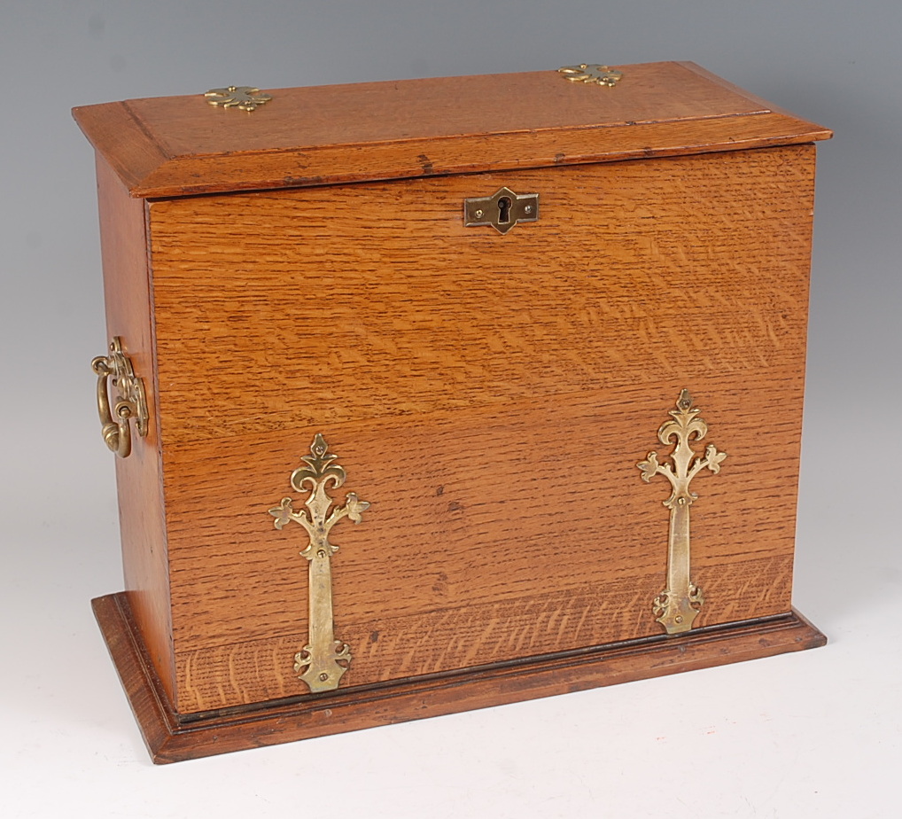 A Victorian oak stationery cabinet, with cut brass mounts, the hinged cover and fall-front opening - Image 2 of 2