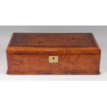 A mid-19th century burr walnut and mahogany crossbanded fold-over writing slope, having flush