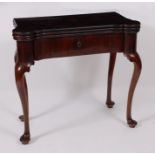 A George III Colonial calamander triple leaf card table, having proud corners, the tops each being