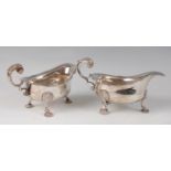 A pair of Edwardian silver sauceboats, in the mid-18th century style, each having acanthus leaf