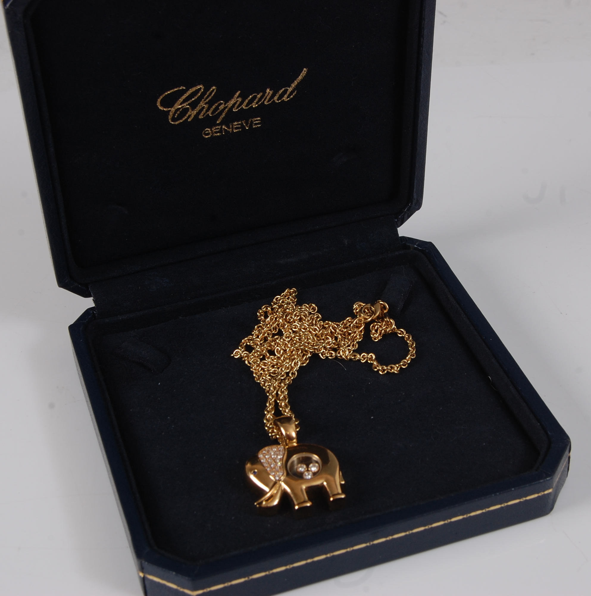 A Chopard 18ct gold Happy Diamonds elephant pendant, the ears pavé set with 24 small brilliant cut - Image 4 of 5