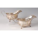 A pair of silver sauceboats in the Georgian style, each raised on stepped feet, 12.4oz, maker
