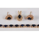 A contemporary 18ct gold, sapphire and diamond point set bracelet, arranged as 25 four-claw set oval