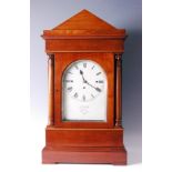 J.W. Benson of London - a mid-Victorian mahogany library clock, the architectural case with twin