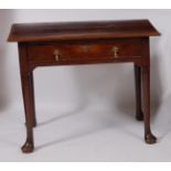 A George III oak single drawer side table, the two-plank top having a moulded edge, the whole raised