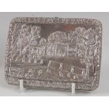 A circa 1900 Indian silver pocket cigarette case, decorated to both sides with extensive river