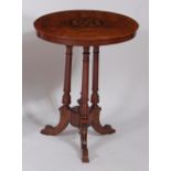 A mid-Victorian figured walnut and inlaid circular occasional table, raised on three turned column