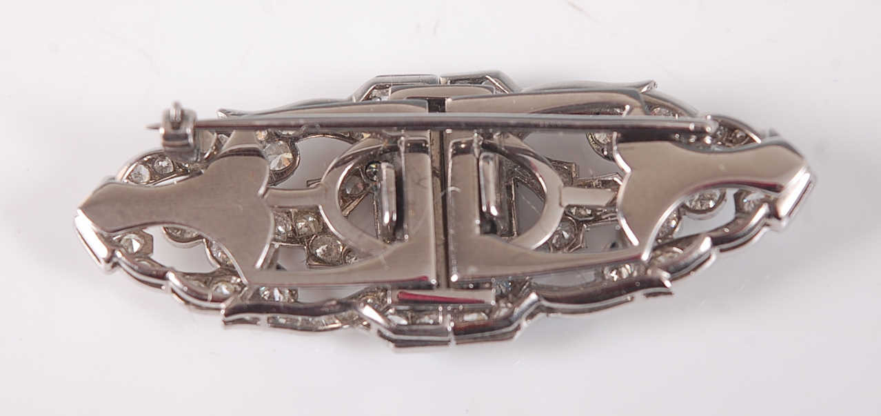 A white metal oblong Art Deco style diamond panel brooch, featuring a centre section of four - Image 2 of 2