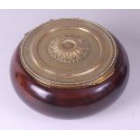 A 19th century highly polished fruitwood and brass topped tobacco jar, the hinged cover with
