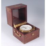 A late 20th century mahogany and gilt brass cased ships clock by Montremo, the brass bound case with