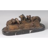 After Friedrich Gornik - a bronze model of livestock feeding from a trough, bears signature and