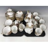 Approximately 95 items of Royal Albert old Country Roses tea and dinner ware comprising teapots, a