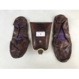 A vintage pair of travel slippers