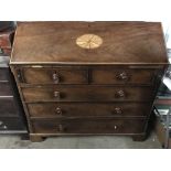 An early 19th Century inlaid mahogany fall-front bureau