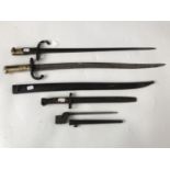 A French Mle 1866 bayonet, a French Mle 1874, British Pattern 1888 and a No 4 bayonet