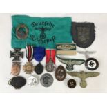 A quantity of largely reproduction German badges and medals