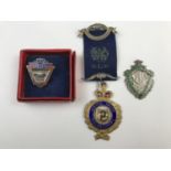 A George V silver-gilt Masonic medal, Birmingham, 1913, a white-metal Coventry Team Swimming and