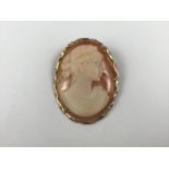 A 1960s 9ct gold mounted Italian shell cameo brooch, 4.5 x 3.5 cm
