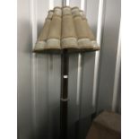 A George V oak standard lamp with shade