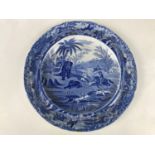 An early 19th century Spode blue-and-white Death to the Bear pattern plate, 25 cm diameter