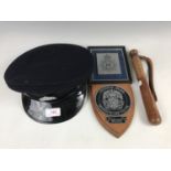A Royal Hong Kong police cap together with truncheon and plaques
