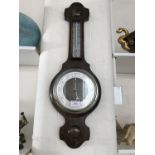 A Victorian oak banjo barometer