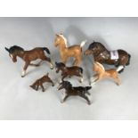 Seven Beswick horses and foals, to include a Shetland pony, two Palomino foals (one with small