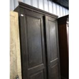 A Victorian oak two door cupboard