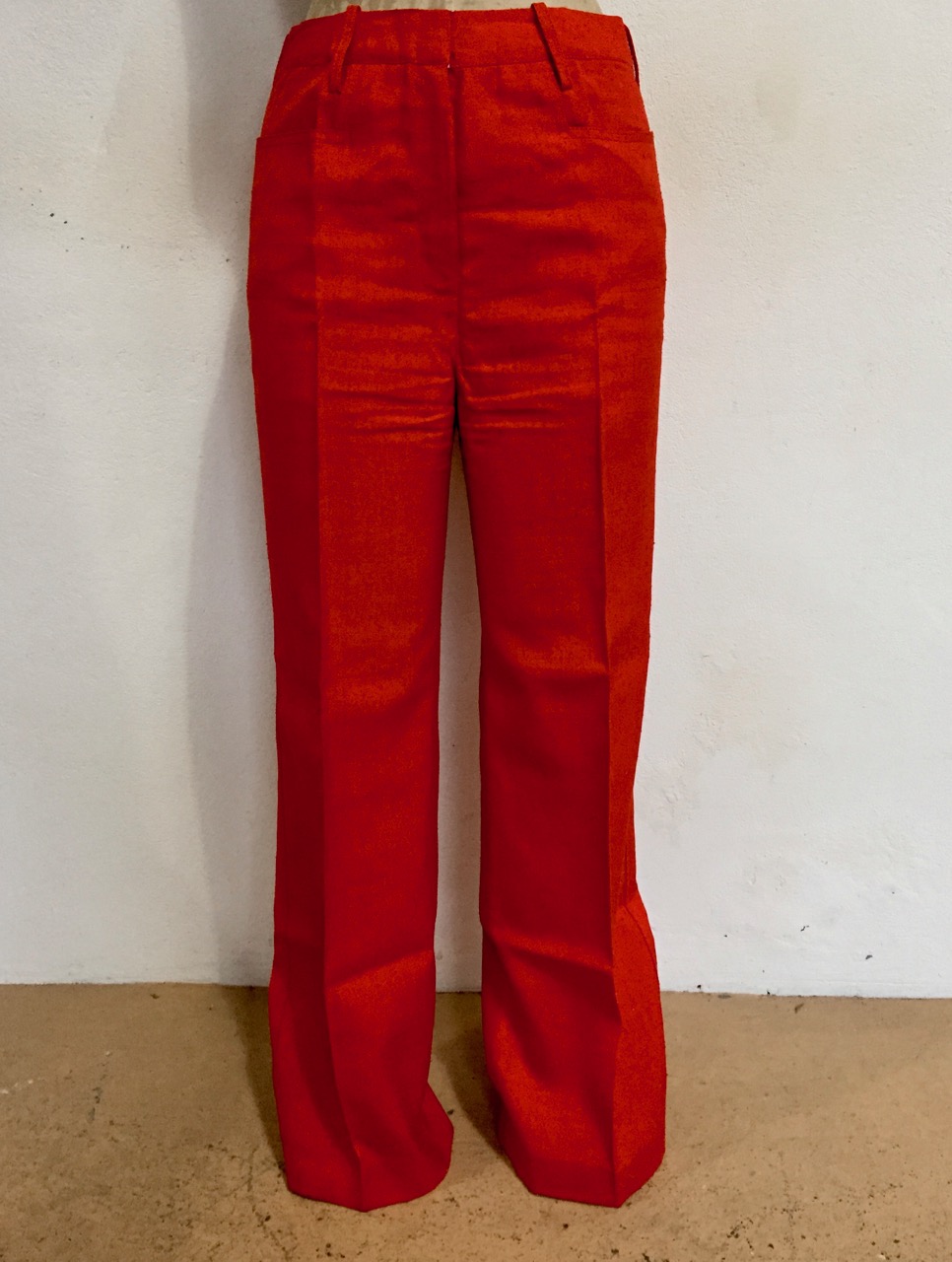 1960s and 1970s ladies' designer silk and other trousers, to include a pair of red and a pair of