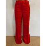 1960s and 1970s ladies' designer silk and other trousers, to include a pair of red and a pair of