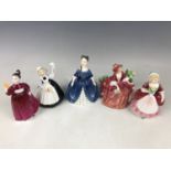 Five Royal Doulton figurines including Debbie HN2385, Vanity HN2475, Valerie HN 2107, Mothers Help