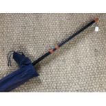 A 12' two-section Daiwa Surf Cast fishing rod