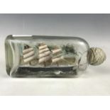 An early 20th Century ship in a bottle