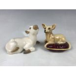 A Beswick chihuahua together with a Szeiler calf figurine