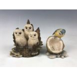 Two boxed Border Fine Art figurines including Tawny Owlets 081 and Blue Tit RB3