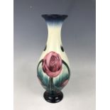A contemporary Old Tupton Ware vase, tube-line decorated in a Rennie Mackintosh inspired design,