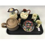 A Sharon teapot, 42290 (a/f) together with Torquay motto ware jugs and a Denby teapot etc
