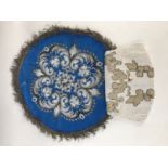 Edwardian beadwork, including a lady's chain-stitched and beaded purse, and a circular doily with