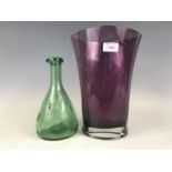 An onion bottle together with a Cello contemporary amethyst glass vase